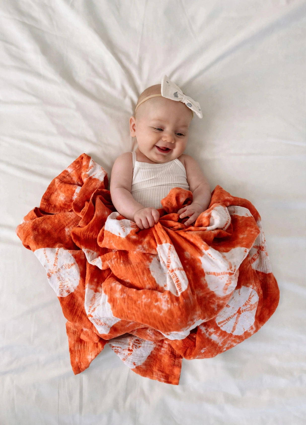 Organic Cotton Muslin Shibori Swaddle - Coral